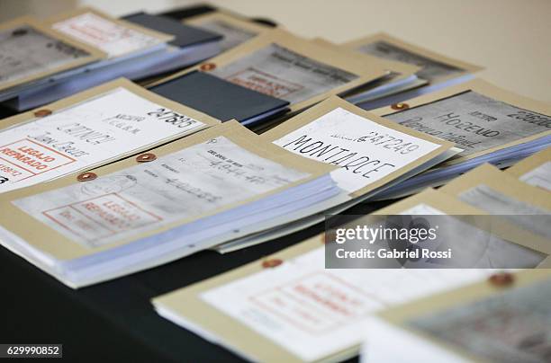 Details of repaired files to the descendants of 20 disappeared railway workers at Archivo Nacional de la Memoria on December 15, 2016 in Buenos...