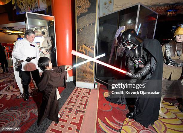 Fans interact with performers at the Opening Night Celebrations of Walt Disney Pictures and Lucasfilm's "Rogue One: A Star Wars Story" at The TCL...