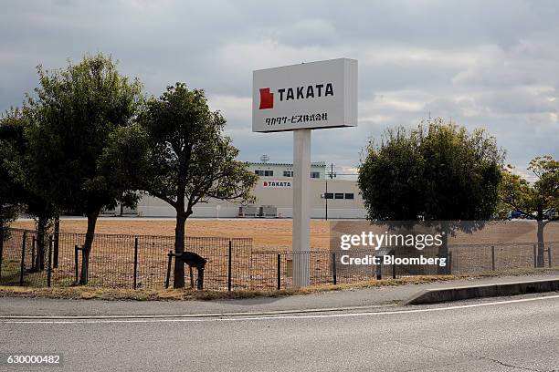 Signage for Takata Corp. Are displayed at the company's Hikone plant in Hikone, Shiga, Japan, on Friday, Nov. 25, 2016. Takata's selection of a...