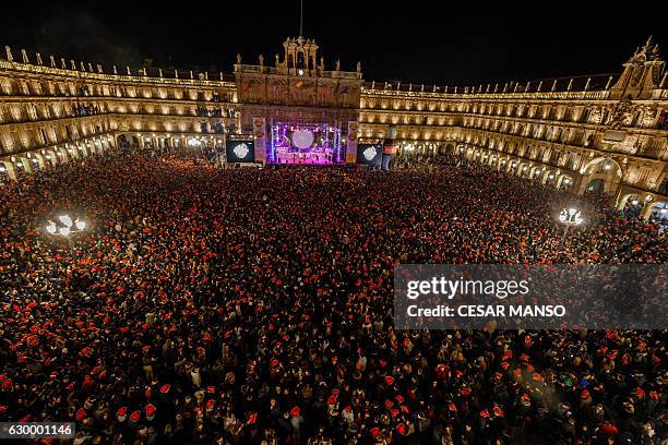 Students celebrate during the traditional year-end party held in the main square of Salamanca, Spain on December 15, 2016. The student end of year...