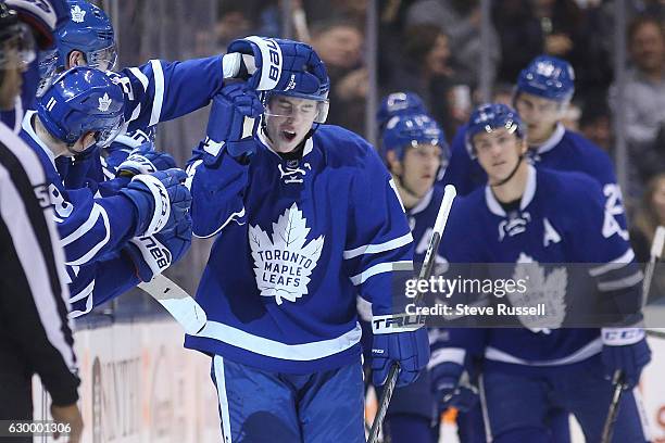 Toronto Maple Leafs center Mitchell Marner celebrates after scoring as the Toronto Maple Leafs play the Arizona Coyotes at the Air Canada Centre in...