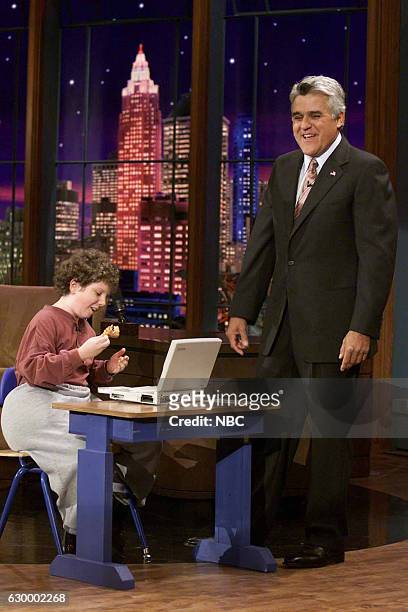 Episode 2775 -- Pictured: Host Jay Leno with a kid inventor during the "Back to School Products" segment on September 10, 2004 --