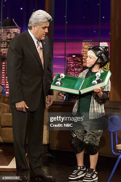 Episode 2775 -- Pictured: Host Jay Leno with a kid inventor during the "Back to School Products" segment on September 10, 2004 --