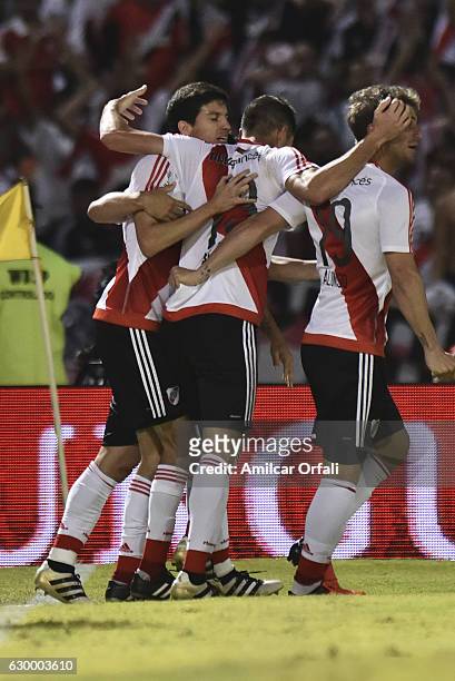 Lucas Alario of River Plate celebrates with teammates after scoring the third goal of his team during a final match between River Plate and Rosario...