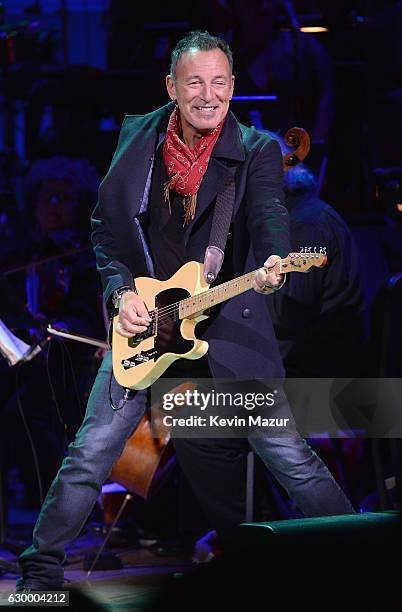 Bruce Springsteen performs onstage during The Revlon Concert for the Rainforest Fund, "Baby It's Cold Outside" at Carnegie Hall on December 14, 2016...