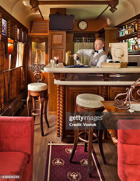 the waiter in the luxury trans siberian express train - dining car stock pictures, royalty-free photos & images