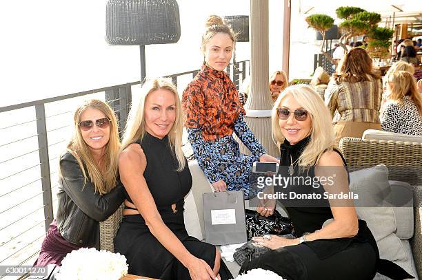 Guest, Danica Perez, fashion blogger Nikita Kahn and songwriter Linda Thompson attend Sabine Brouillet's jewelry pop up hosted by Nikita Kahn and...