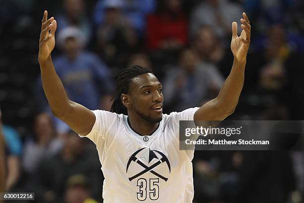 Kenneth Faried of the Denver Nuggets celebrates a basket against the Portland Trail Blazers at the Pepsi Center on December 15, 2016 in Denver,...