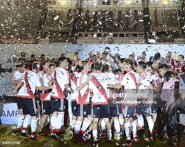 Players of River Plate lift the trophy after a final match between River Plate and Rosario Central as part of Copa Argentina 2016 at Mario Alberto...