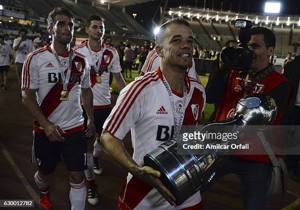Andres D´alessandro of River Plate holds the trophy after a final match between River Plate and Rosario Central as part of Copa Argentina 2016 at...