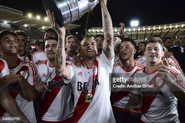 Andres D´alessandro of River Plate lifts the trophy after a final match between River Plate and Rosario Central as part of Copa Argentina 2016 at...