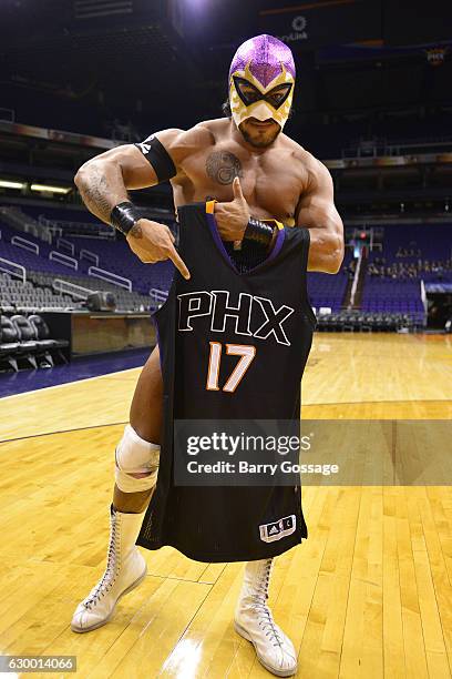 Wrestler El Hijo Del Fantasma poses for a picture before the game between the Phoenix Suns and the San Antonio Spurs on December 15, 2016 at U.S....