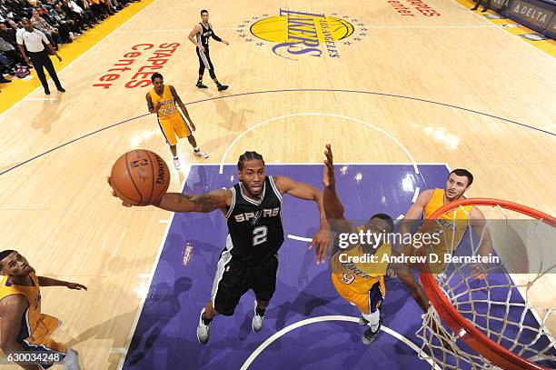 Kawhi Leonard of the San Antonio Spurs goes up for a lay up against the Los Angeles Lakers on November 18, 2016 at STAPLES Center in Los Angeles,...