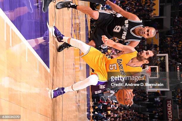Jose Calderon of the Los Angeles Lakers handles the ball against the San Antonio Spurs on November 18, 2016 at STAPLES Center in Los Angeles,...