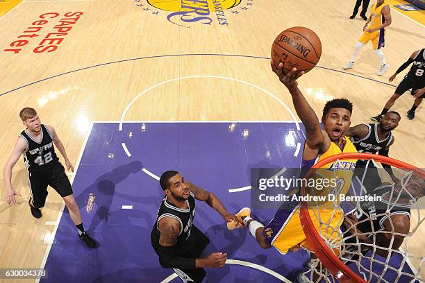 Nick Young of the Los Angeles Lakers goes up for a lay up against the San Antonio Spurs on November 18, 2016 at STAPLES Center in Los Angeles,...