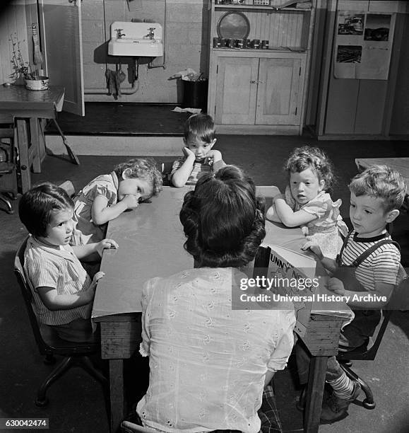 Story Hour, Nursery School in Federal Housing Project run Cooperatively by Mothers, Greenbelt, Maryland, USA, Marjorie Collins for Farm Security...