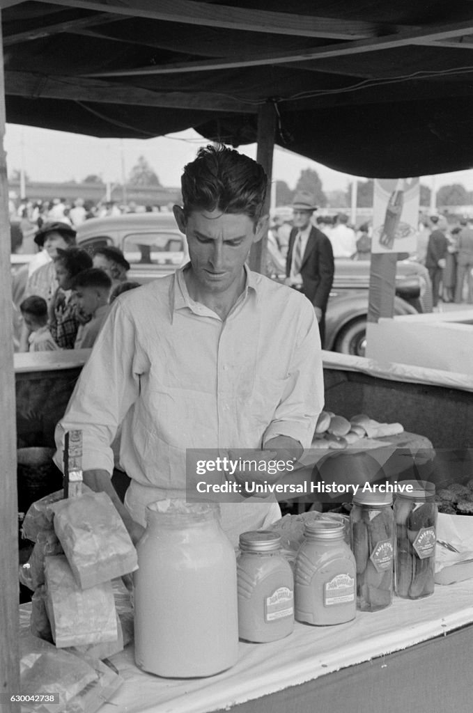 Concessionaire Making Hamburger, State Fair, Donaldsonville, Louisiana