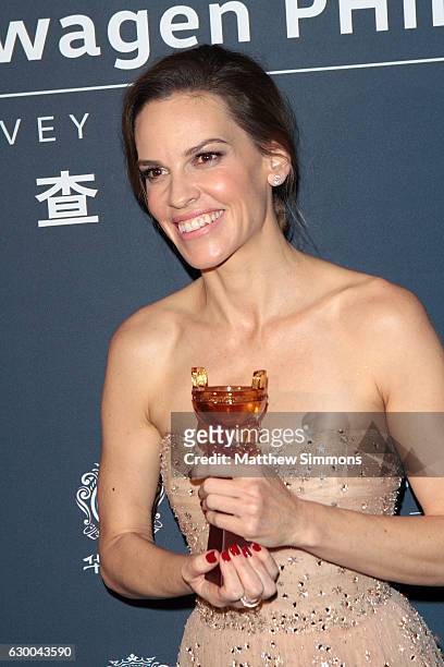 Actress Hilary Swank poses in the press room at the 21st Annual Huading Global Film Awards at The Theatre at Ace Hotel on December 15, 2016 in Los...