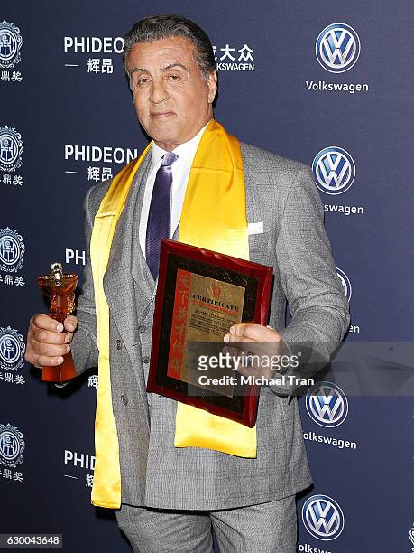 Sylvester Stallone attends the 21st Annual Huading Global Film Awards - press room held at The Theatre at Ace Hotel on December 15, 2016 in Los...