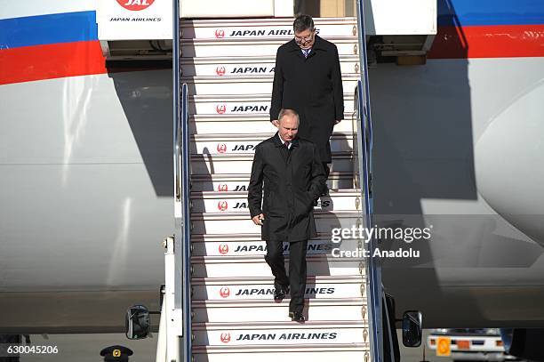 Russian President Vladimir Putin gets off the plane as he arrives at Tokyo Haneda Airport, Japan on December 16, 2016. Japanese Prime Minister Shinzo...