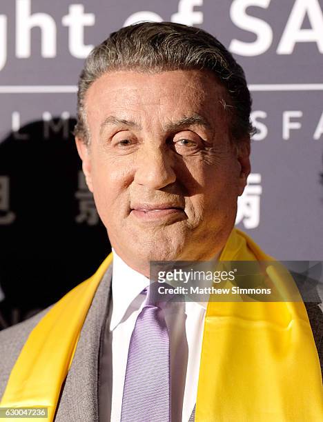 Actor Sylvester Stallone poses in the press room at the 21st Annual Huading Global Film Awards at The Theatre at Ace Hotel on December 15, 2016 in...