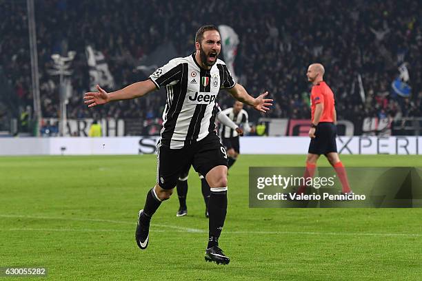 Gonzalo Higuain of Juventus celebrates after scoring the opening goal during the UEFA Champions League Group H match between Juventus and GNK Dinamo...