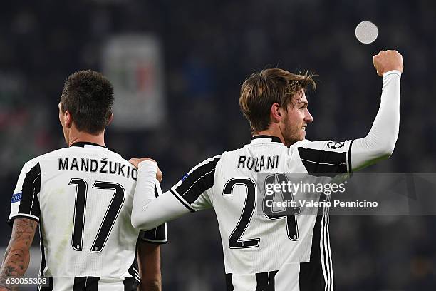 Daniele Rugani of Juventus celebrates a goal with team mate Mario Mandzukic during the UEFA Champions League Group H match between Juventus and GNK...