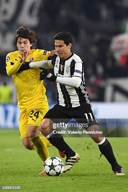 Anderson Hernanes of Juventus is challenged by Ante Coric of GNK Dinamo Zagreb during the UEFA Champions League Group H match between Juventus and...