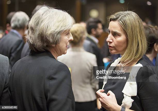 Theresa May, U.K. Prime minister, left, speaks with Federica Mogherini, foreign affairs representative and vice-president of the European Commission,...