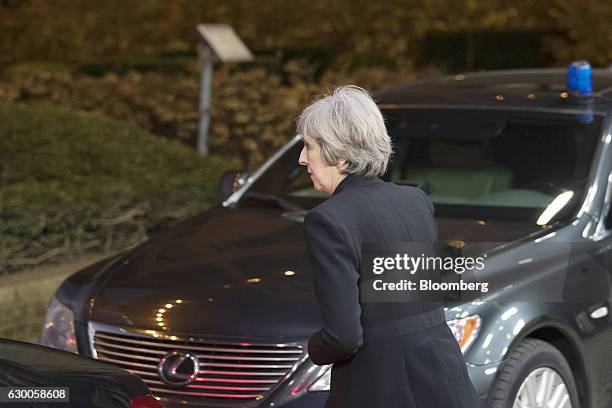 Theresa May, U.K. Prime minister, leaves after meeting with European Union leaders in Brussels, Belgium, on Thursday, Dec. 15, 2016. A first glimpse...