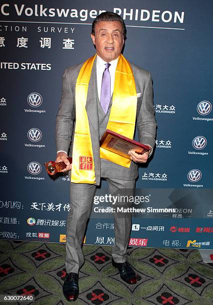 Actor Sylvester Stallone poses in the press room at the 21st Annual Huading Global Film Awards at The Theatre at Ace Hotel on December 15, 2016 in...