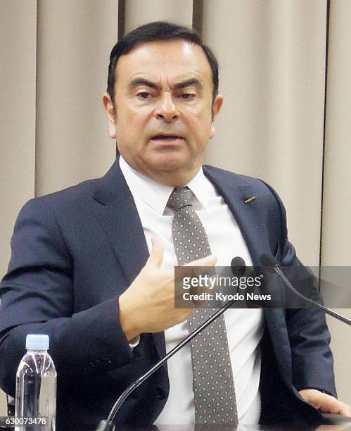 Nissan Motor Co.'s top executive Carlos Ghosn gives an interview to several media organizations, including Kyodo News, on Dec. 16 at the automaker's...