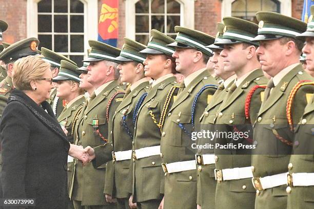 The Minister for Justice Frances Fitzgerald awarding medals serving member of Óglaigh na hÉireann, in this centenary . An Bonn Comórtha Céad Bliain...