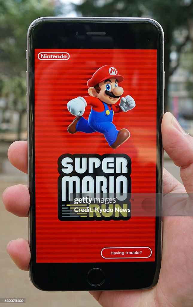 A smartphone displays the start screen of