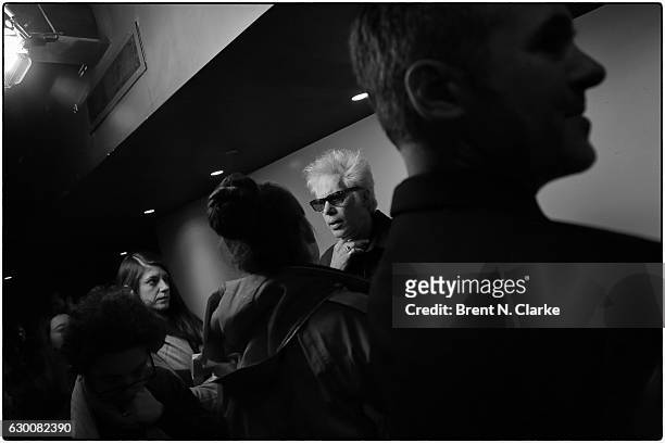 Director Jim Jarmusch speaks to a reporter during the "Paterson" New York screening held at the Landmark Sunshine Cinema on December 15, 2016 in New...