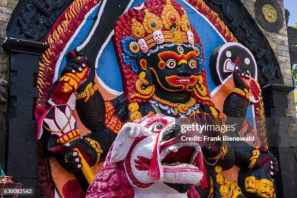 The colorfully painted idols at Kala Bhairava Shrine at Durbar Square.