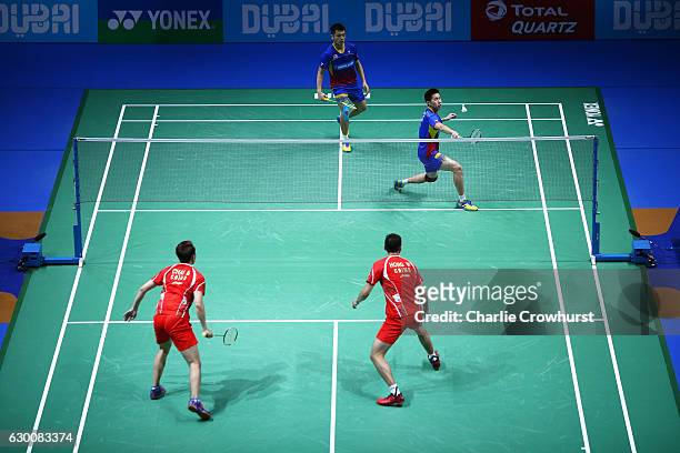 Shem Goh and Wee Kiong Tan of Malaysia in action during their mens doubles match against Chai Biao and Hong Wei of China on Day Three of the BWF...