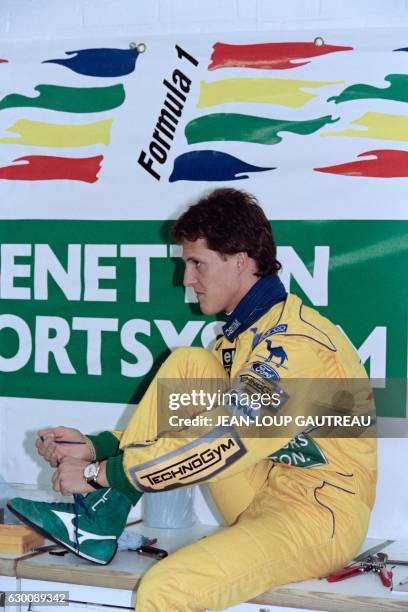 German driver Michael Schumacher prepares himself before the start of the unofficial practise session on April 8, 1993 prior to the European Formula...