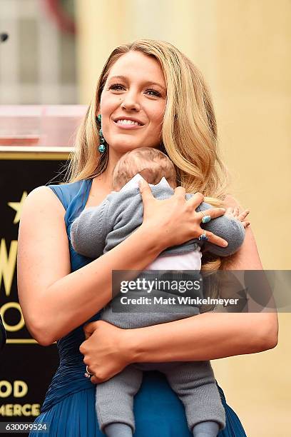 Actress Blake Lively poses for a photo with her daughter as Ryan Reynolds is honored with star on the Hollywood Walk of Fame on December 15, 2016 in...