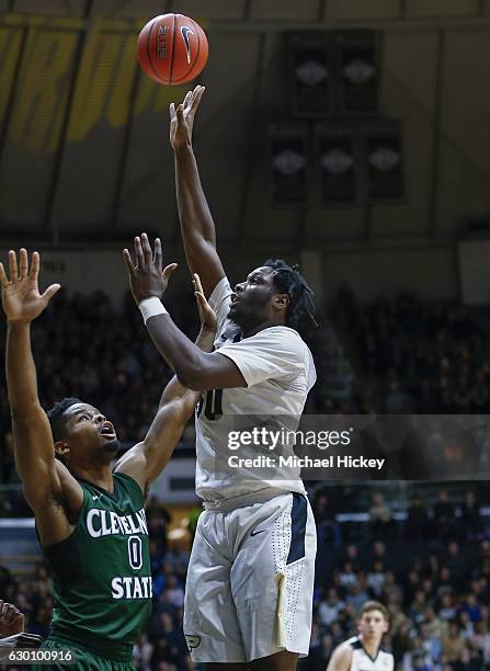 Caleb Swanigan of the Purdue Boilermakers shoots the ball against Derek Sloan of the Cleveland State Vikings at Mackey Arena on December 10, 2016 in...