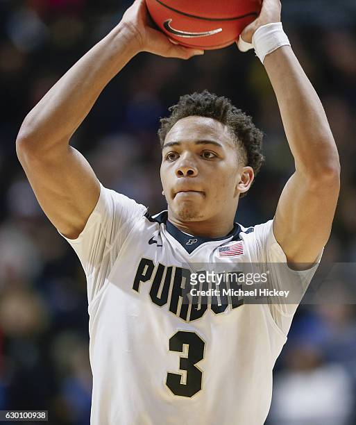 Carsen Edwards of the Purdue Boilermakers looks for a teammate to pass to during the game against the Cleveland State Vikings at Mackey Arena on...