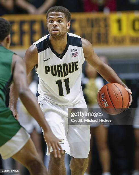 Thompson of the Purdue Boilermakers brings the ball up court during the game against the Cleveland State Vikings at Mackey Arena on December 10, 2016...