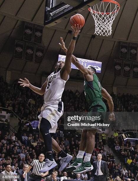 Basil Smotherman of the Purdue Boilermakers shoots the ball against Derek Sloan of the Cleveland State Vikings at Mackey Arena on December 10, 2016...