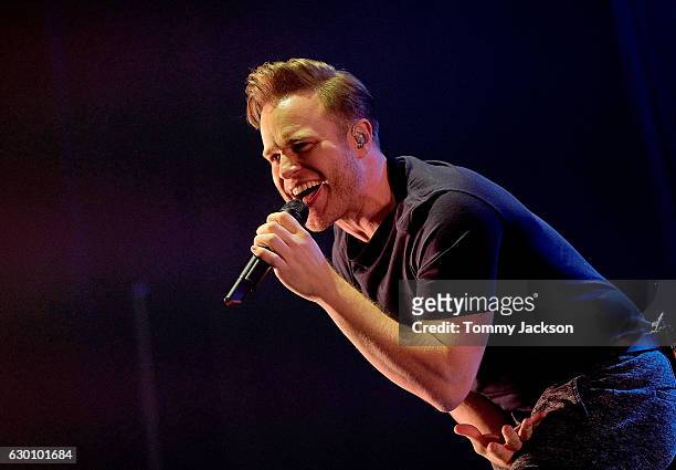 Olly Murs performs on stage during Metro Radio Christmas Live at Metro Radio Arena on December 16, 2016 in Newcastle upon Tyne, England.