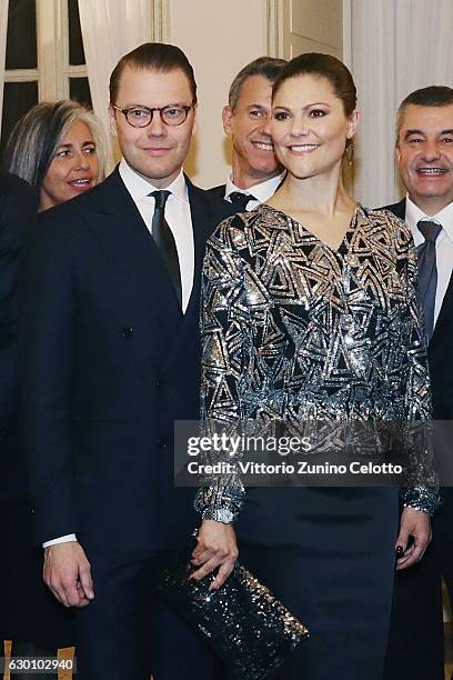 Princess Victoria of Sweden and Prince Daniel of Sweden attend a party honouring the Swedish Crown Couple and Minister Ekstrom in Milan on December...