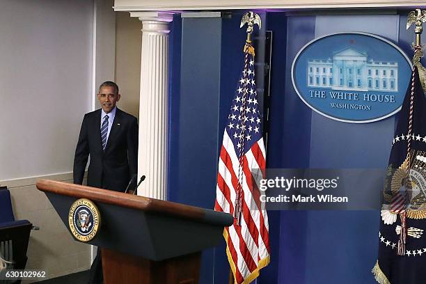 President Barack Obama arrives for a news conference in the Brady Press Breifing Room at the White House December 16, 2016 in Washington, DC. In what...