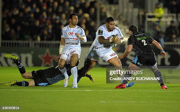 Racing 92's New Zealand prop Ben Tameifuna is tackled by Glasgow Warriors' Scottish hooker Fraser Brown during the European Champions Cup pool 1...