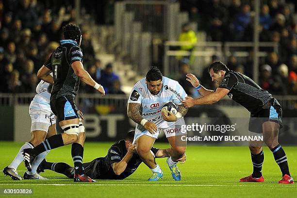 Racing 92's New Zealand prop Ben Tameifuna is tackled during the European Champions Cup pool 1 rugby union match between Glasgow Warriors and Racing...