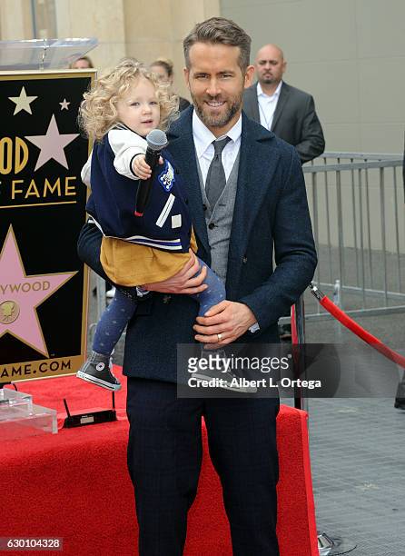 Actor Ryan Reynolds with daughter James at Ryan Reynolds' Star Ceremony On The Hollywood Walk Of Fame on December 15, 2016 in Hollywood, California.
