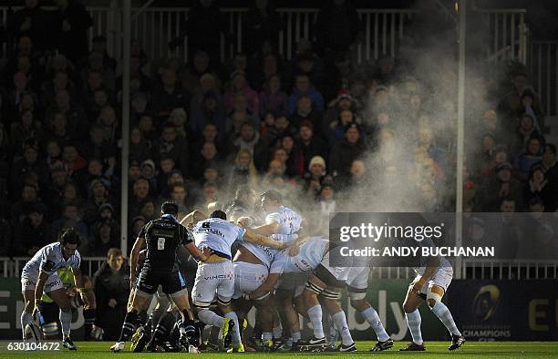 Steam rises above the packs after a scrum during the European Champions Cup pool 1 rugby union match between Glasgow Warriors and Racing 92 at...